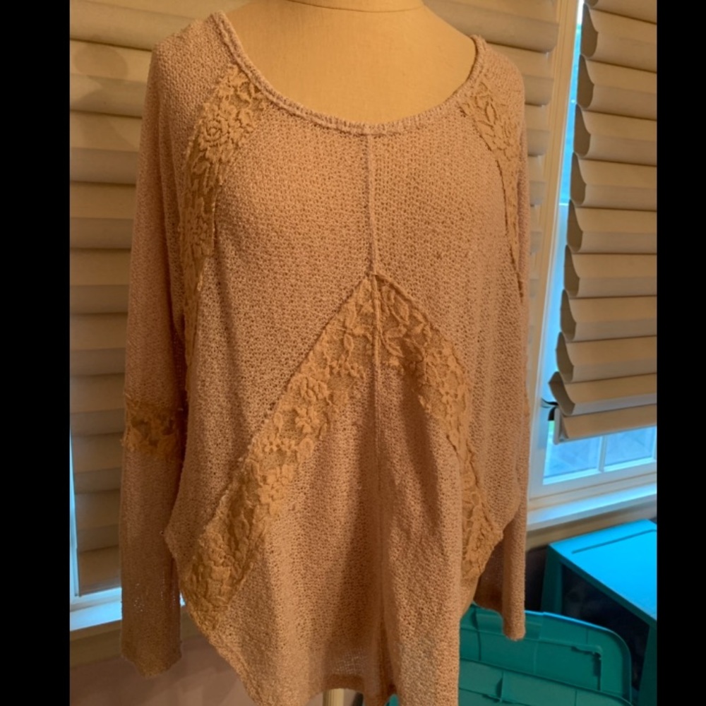 Free people sweater. Longer in back.